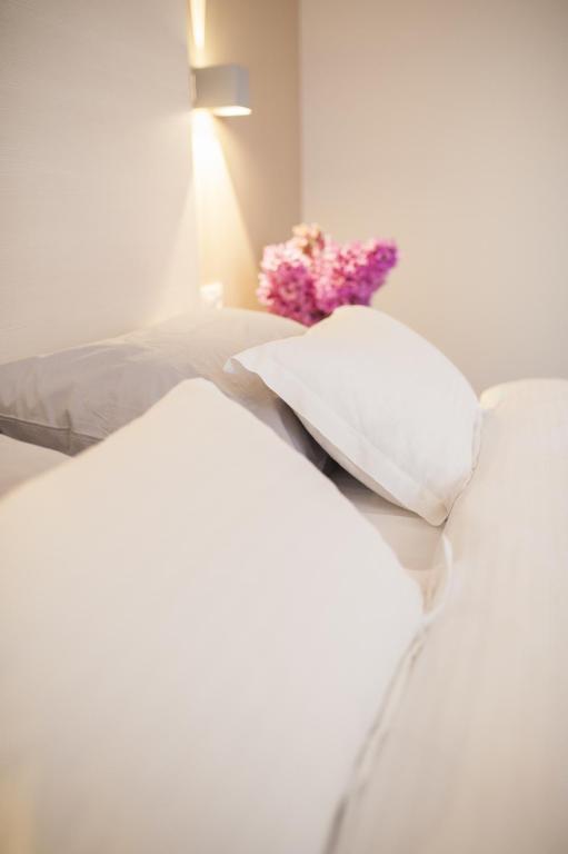 Postel nebo postele na pokoji v ubytování Hotel Konavle