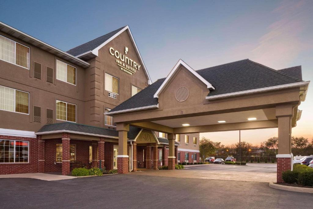 a rendering of a hotel with a parking lot at Country Inn & Suites by Radisson, Lima, OH in Lima