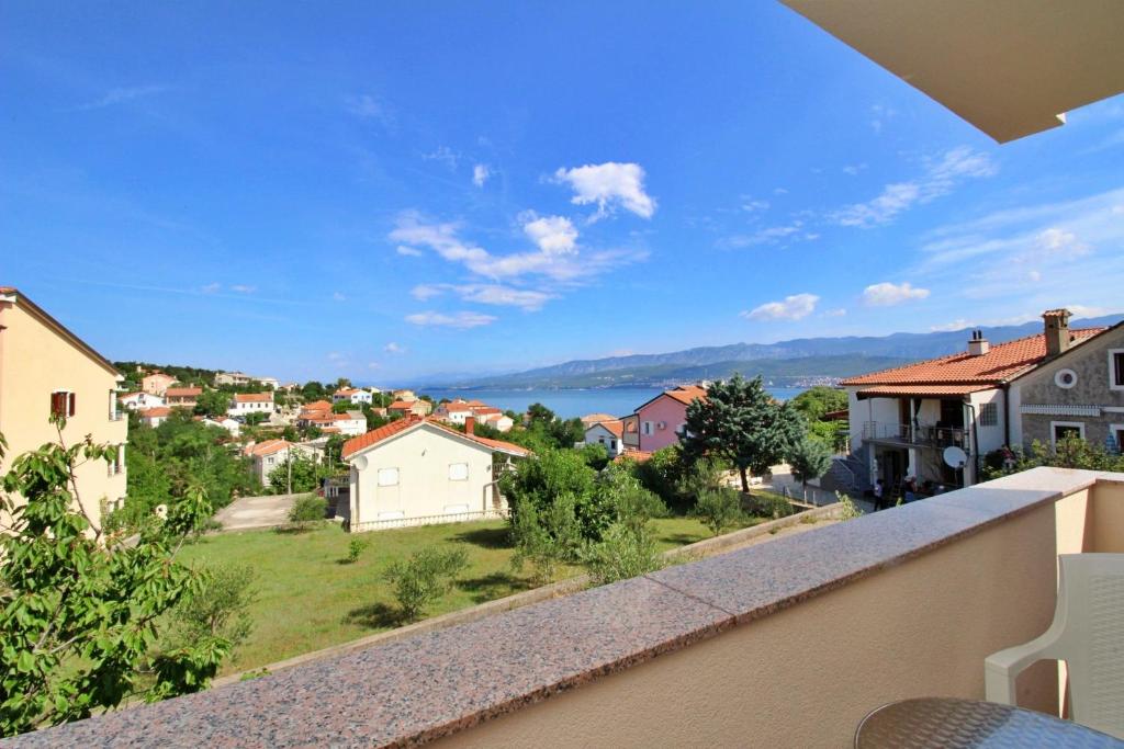 a view from the balcony of a house at Apartment Dunato I in Šilo