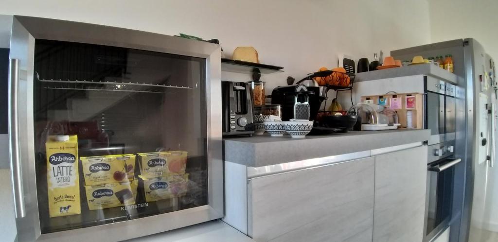 Kuchyňa alebo kuchynka v ubytovaní Casa Rosy - Stanza privata con bagno esclusivo e parcheggio gratuito