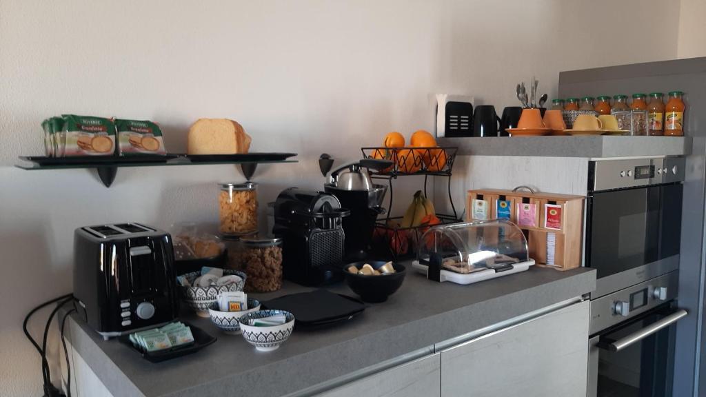 Kuchyňa alebo kuchynka v ubytovaní Casa Rosy - Stanza privata con bagno esclusivo e parcheggio gratuito