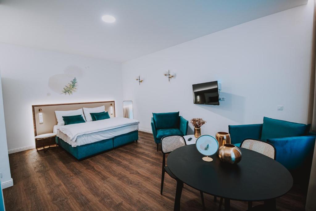 Postel nebo postele na pokoji v ubytování Resort Český les