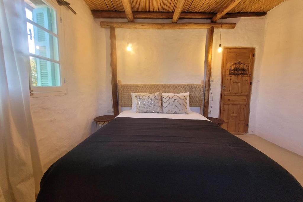 Postel nebo postele na pokoji v ubytování Khanfous Retreat