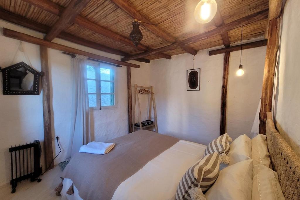 Postel nebo postele na pokoji v ubytování Khanfous Retreat