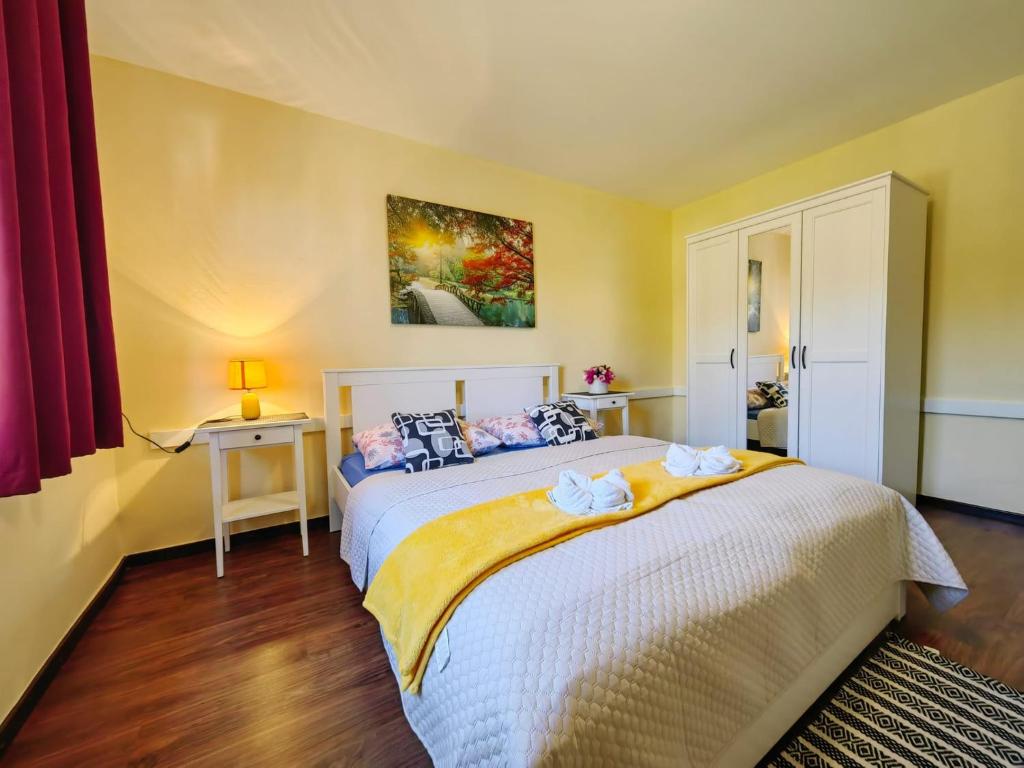 Postel nebo postele na pokoji v ubytování Apartmani Sabina