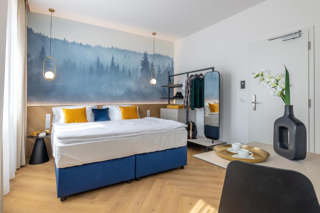 Postel nebo postele na pokoji v ubytování Resort Český les