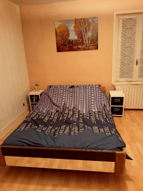 Llit o llits en una habitació de Appartement en Bresse