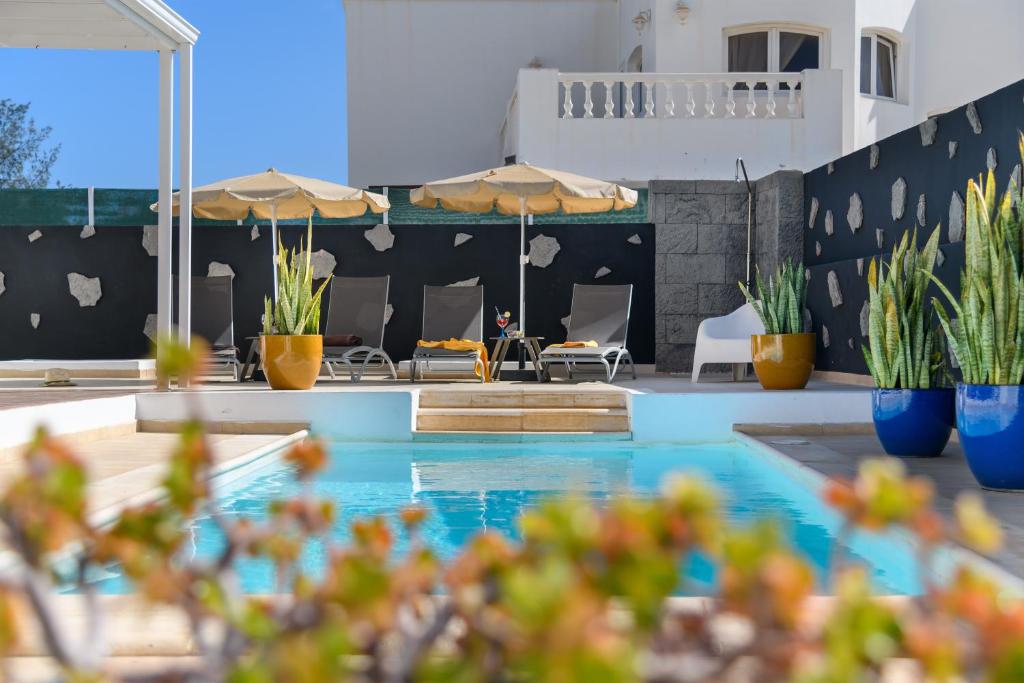 Bazén v ubytování Villa Golf Lanzarote nebo v jeho okolí