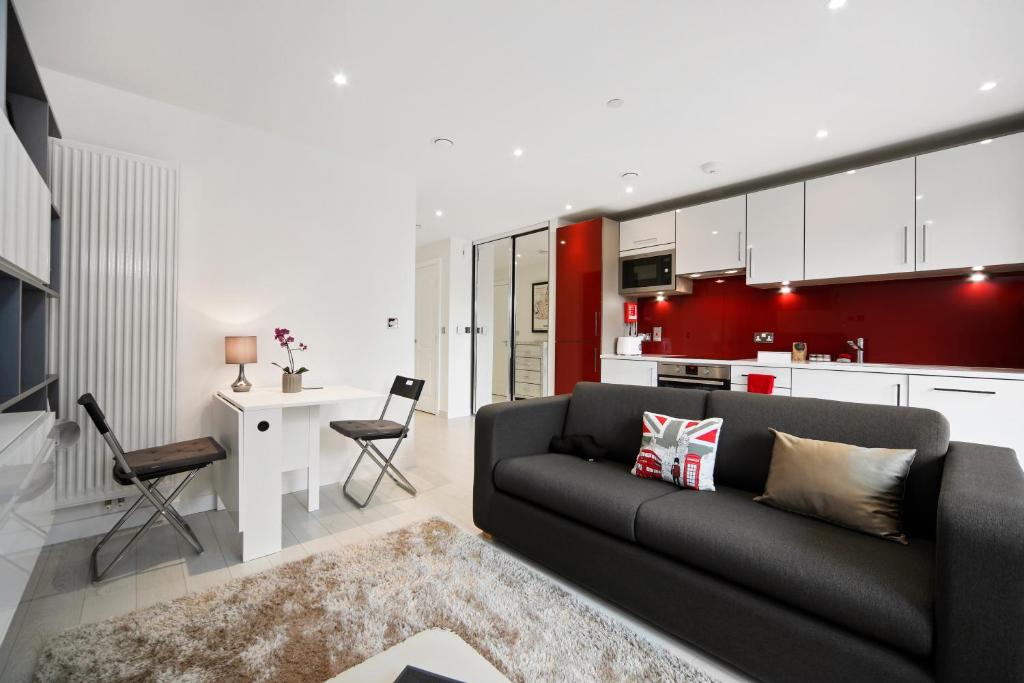 A seating area at Cool Dalston studio with balcony and gym