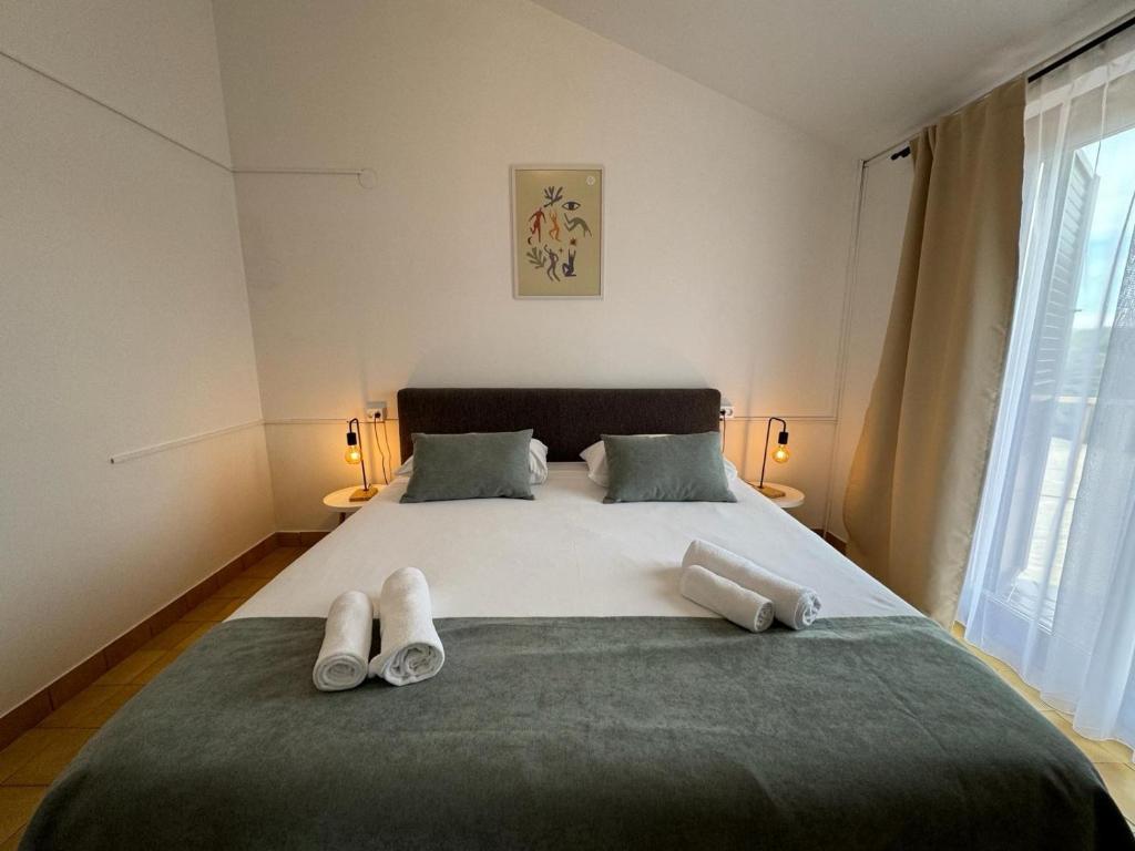 Posteľ alebo postele v izbe v ubytovaní Room accomodation Jezera Lovišća