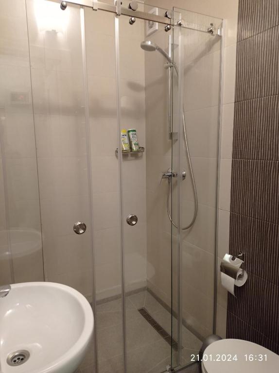 Koupelna v ubytování RynOK 25 Modern Lviv Center