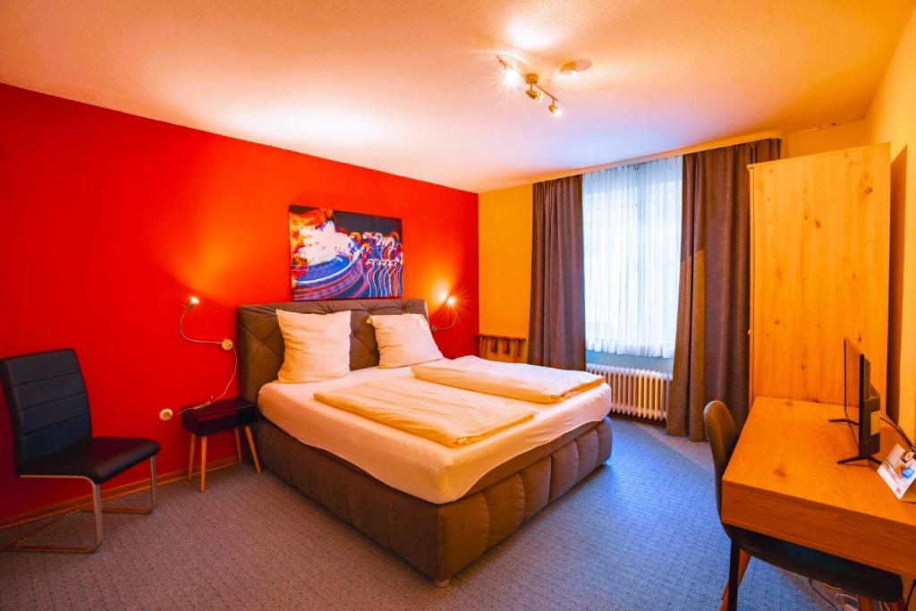 Postel nebo postele na pokoji v ubytování Hotel Starke