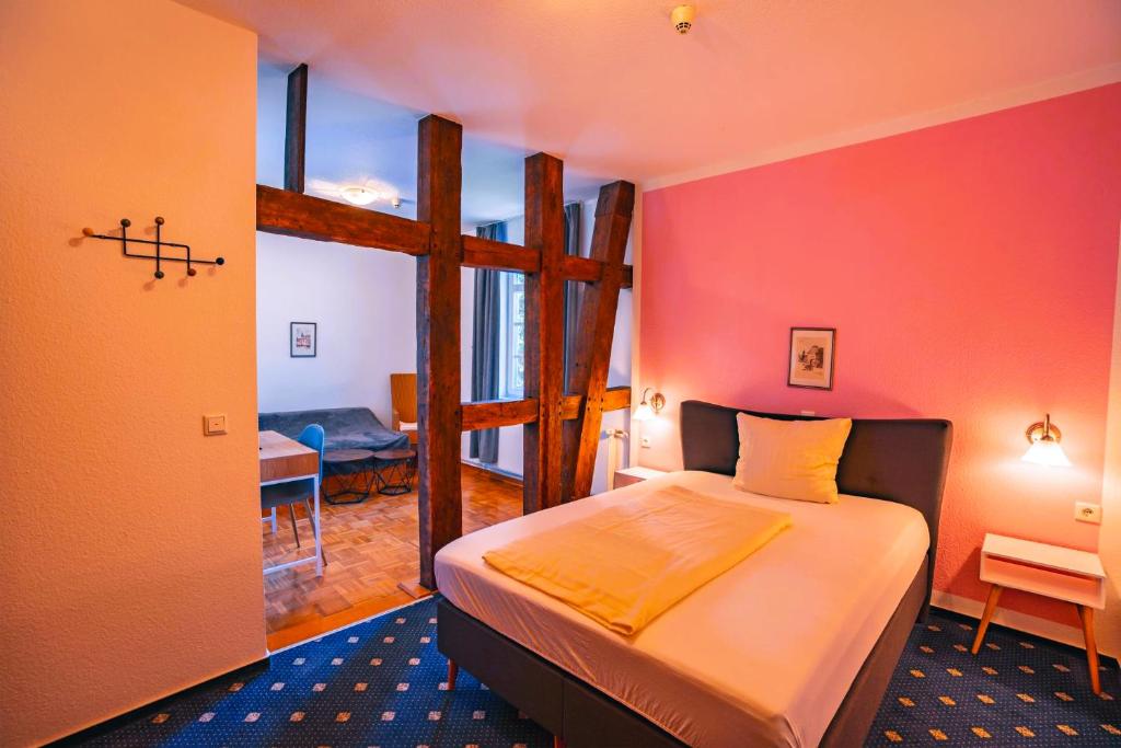Postel nebo postele na pokoji v ubytování Hotel Starke