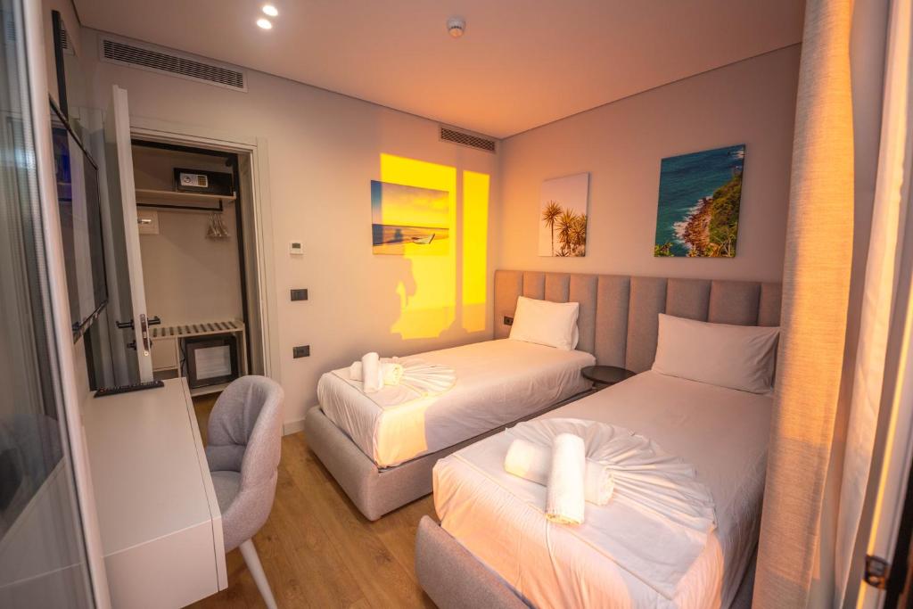 Postel nebo postele na pokoji v ubytování Hotel Sole Mare