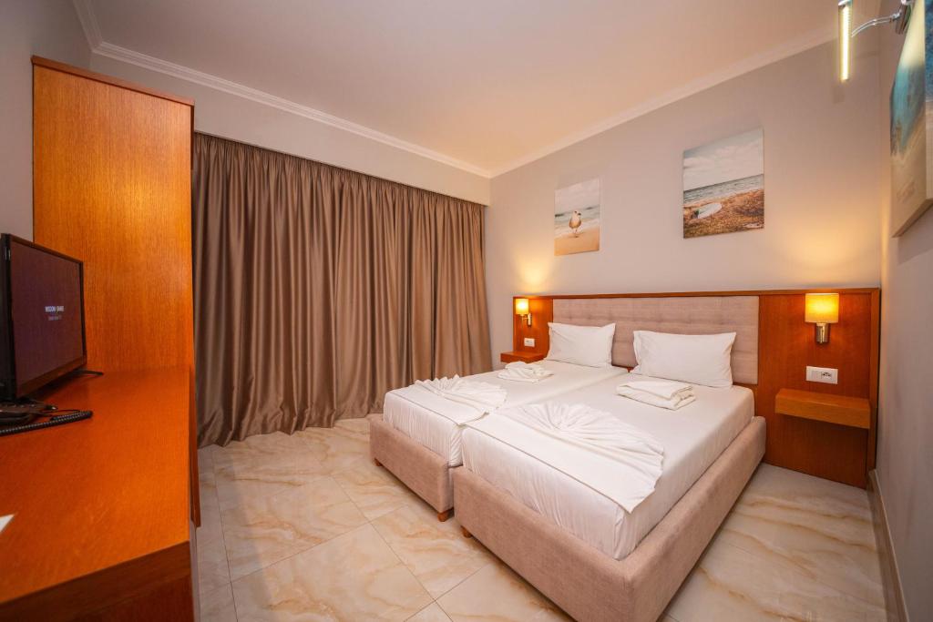 Postel nebo postele na pokoji v ubytování Hotel Sole Mare