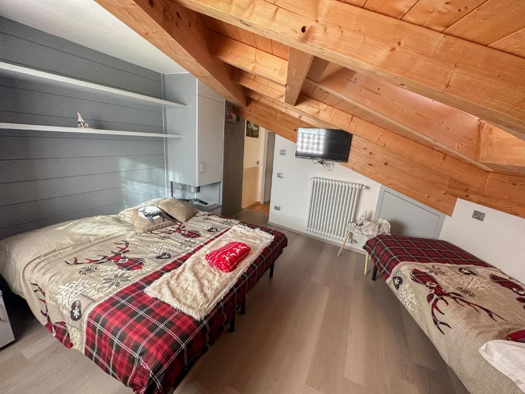 Postel nebo postele na pokoji v ubytování B&B Piazza