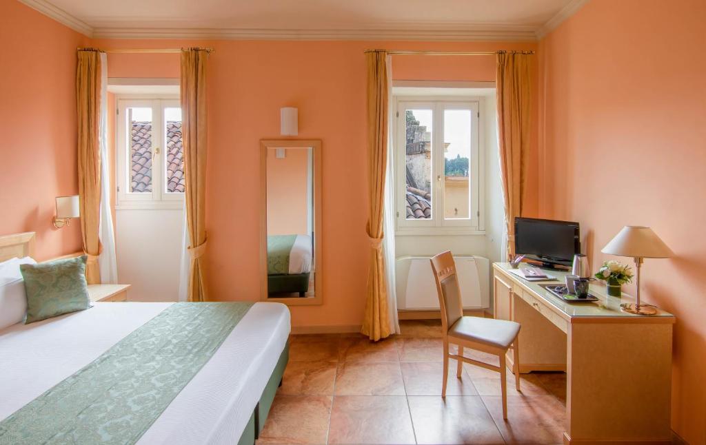 Postel nebo postele na pokoji v ubytování Hotel Belvedere San Gottardo by LVG Hotel Collection