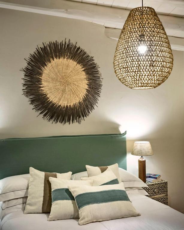 Postel nebo postele na pokoji v ubytování Boutique Hotel Solaz