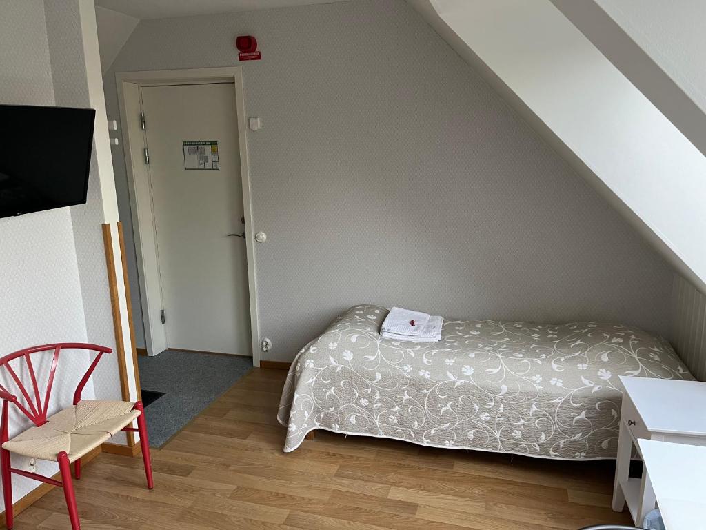 Postel nebo postele na pokoji v ubytování Hobykrok B&B