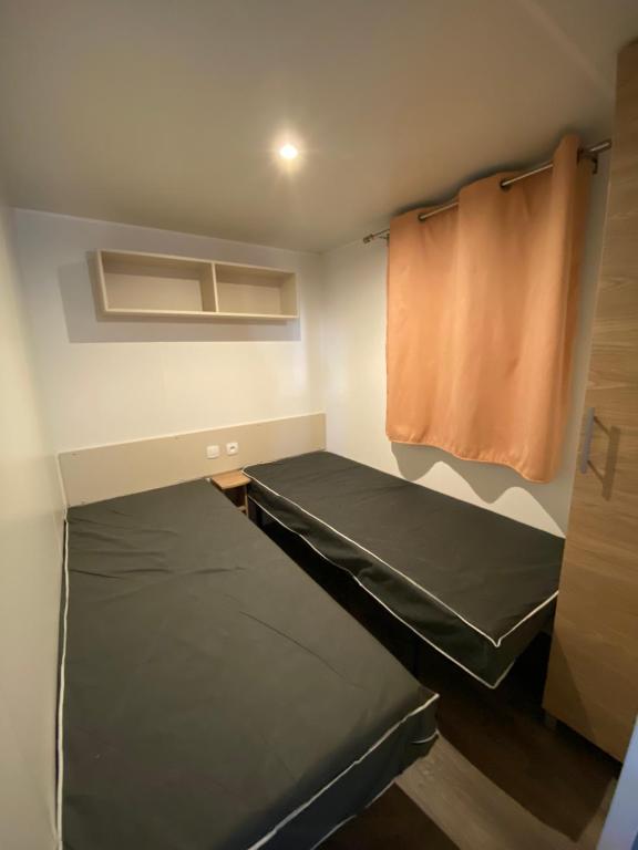 Postel nebo postele na pokoji v ubytování Mobhilomme La Carabasse