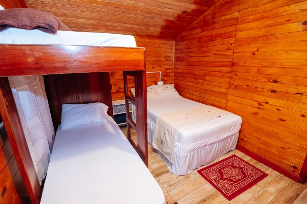 Postel nebo postele na pokoji v ubytování Cabin Renty Beach