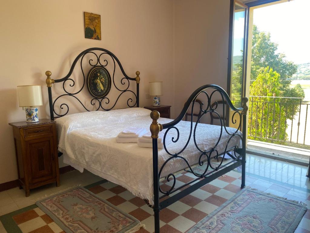 Ліжко або ліжка в номері La Casa Del Contadino