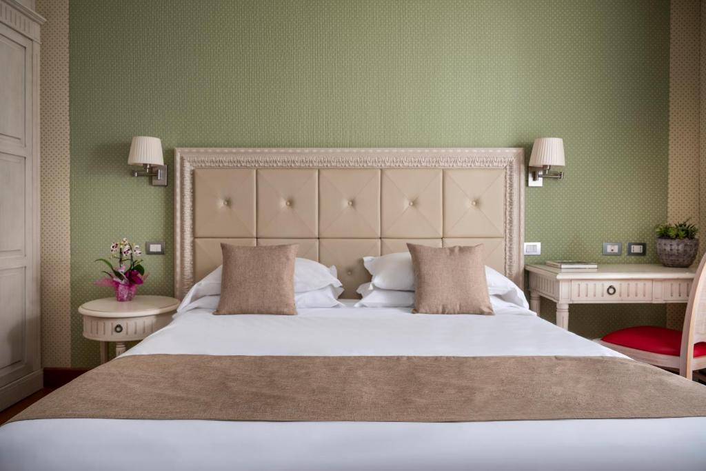 Łóżko lub łóżka w pokoju w obiekcie Grand Hotel Terme & SPA - Chianciano