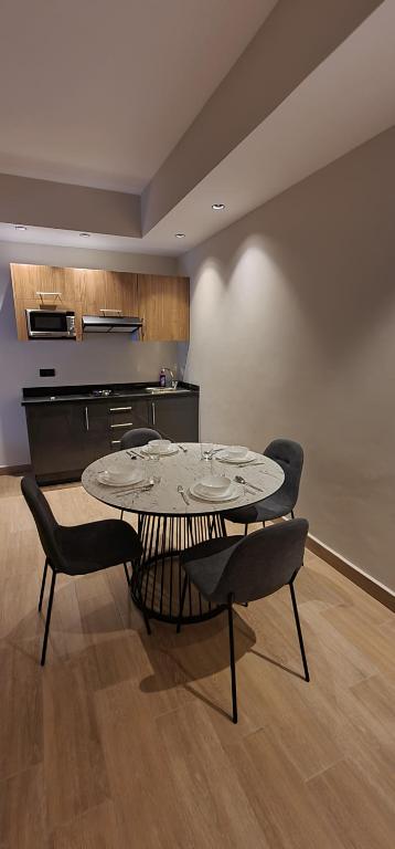 Kuchyň nebo kuchyňský kout v ubytování L'escale Hôtel & Spa By 7AV HOTELS