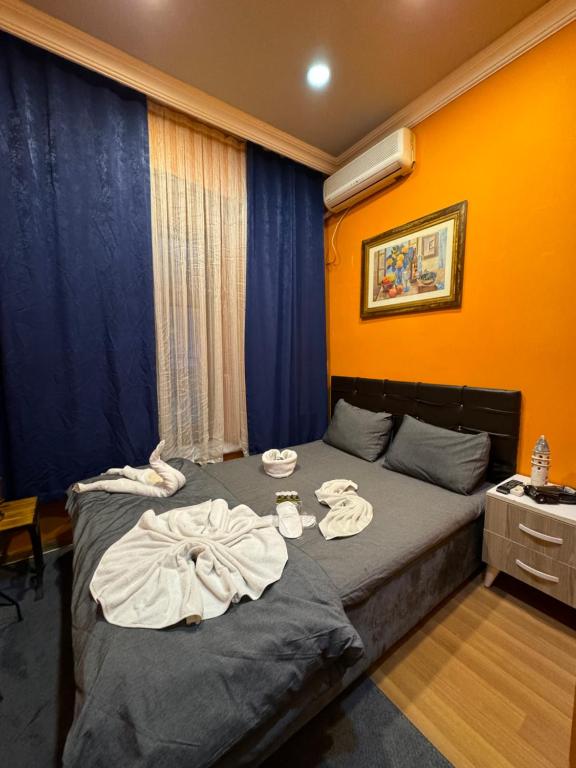 Postel nebo postele na pokoji v ubytování Taksim Pandora hotel