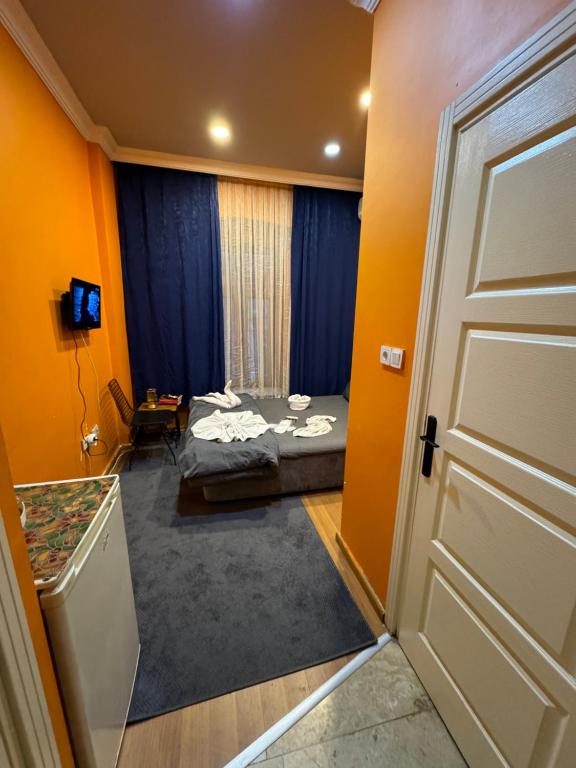 Postel nebo postele na pokoji v ubytování Taksim Pandora hotel