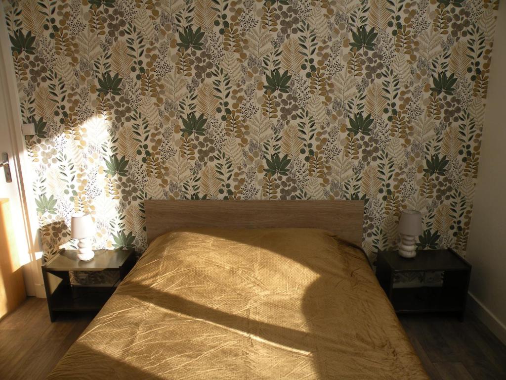 Säng eller sängar i ett rum på Rose, 4 pers. Villa Saint Antoine, Orcival, Sancy