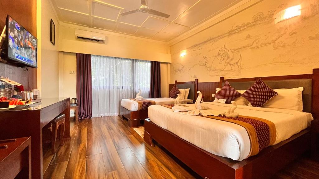 Postel nebo postele na pokoji v ubytování Hotel Jungle Crown