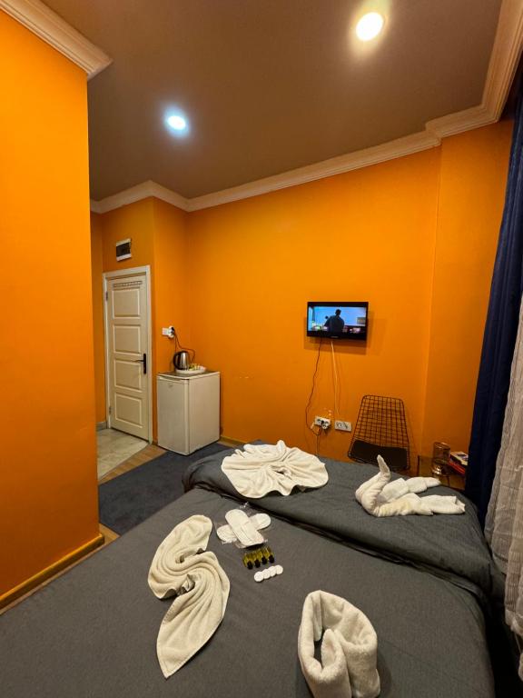 Postel nebo postele na pokoji v ubytování Taksim Pandora hotel