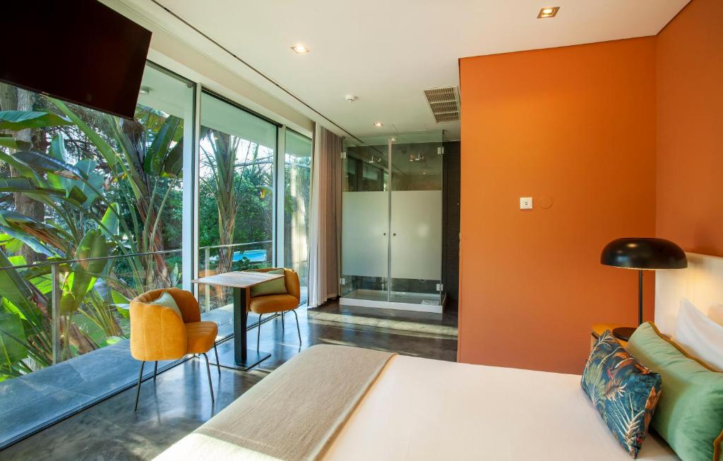 Cama ou camas em um quarto em Casa Vela Boutique House