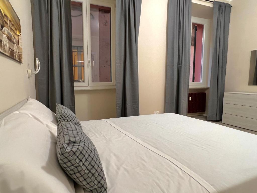 Postel nebo postele na pokoji v ubytování Lomellini One