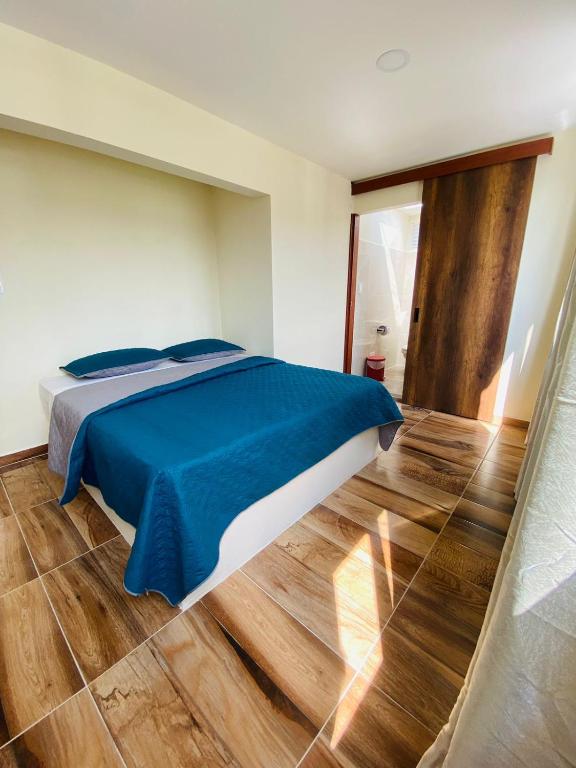 Postel nebo postele na pokoji v ubytování Hostal Don Jose