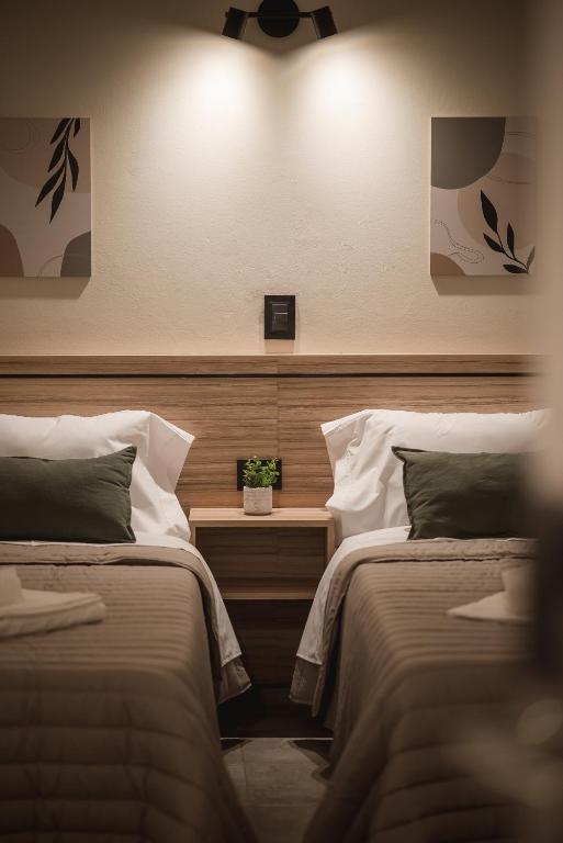 Postel nebo postele na pokoji v ubytování Hotel Libertad