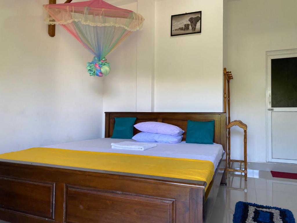 Postel nebo postele na pokoji v ubytování Wild Bee Safari Lodge