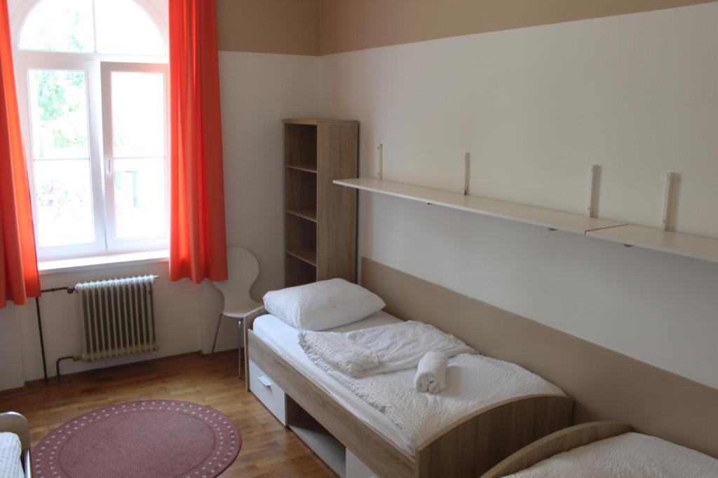 Postel nebo postele na pokoji v ubytování C - Punkt Hostel