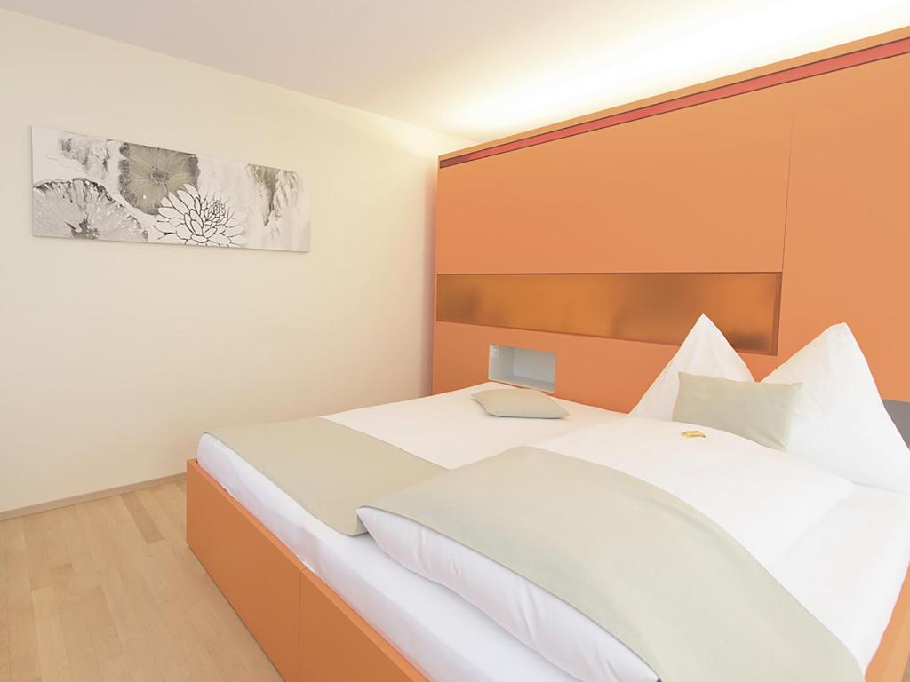 Postel nebo postele na pokoji v ubytování Hotel Engel