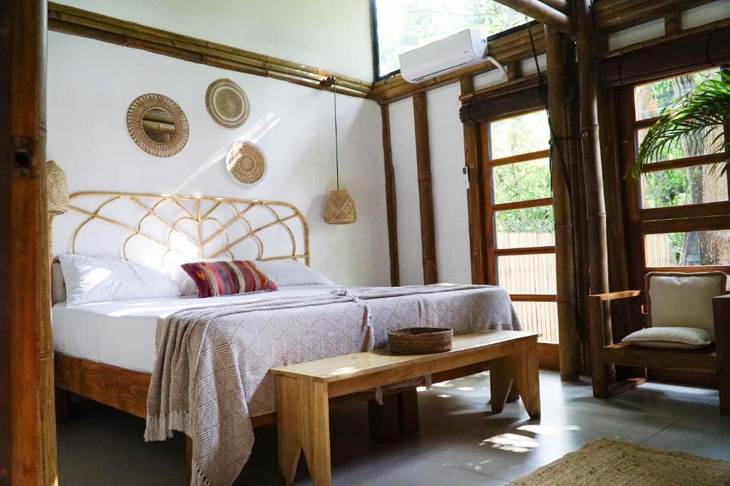 Ένα ή περισσότερα κρεβάτια σε δωμάτιο στο Dream Surf House Santa Teresa (Playa Hermosa)