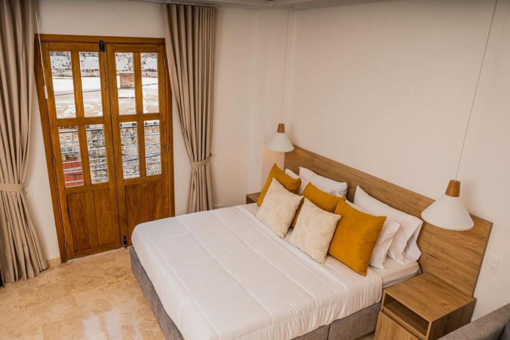 Postel nebo postele na pokoji v ubytování Del Mar Guest House