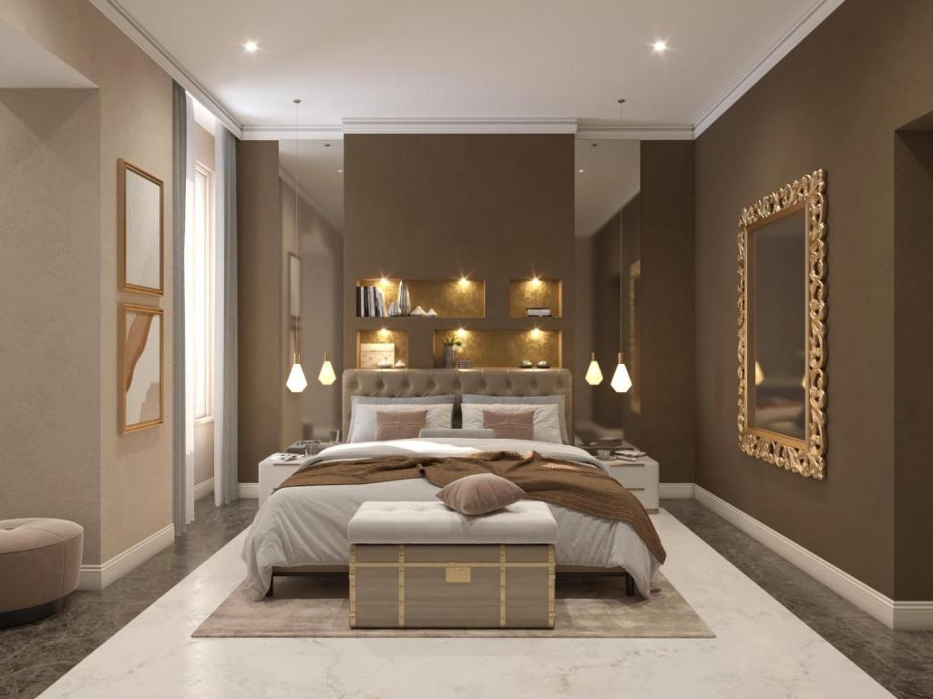 - une chambre avec un grand lit et un grand miroir dans l'établissement Adelaide Suite Dreams, à Rome