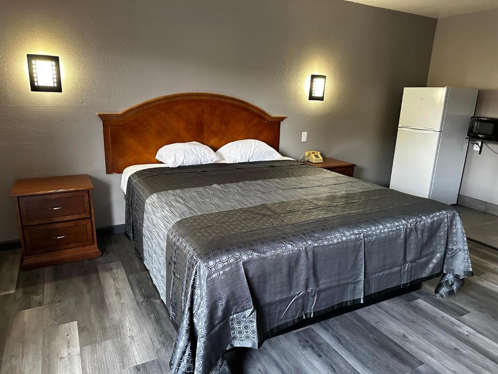 Sunpark Inn & Suites - Habitación Deluxe Con Cama Extragrande
