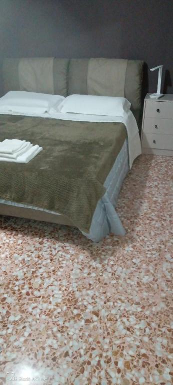 Postel nebo postele na pokoji v ubytování B&B La Dimora dei Professori
