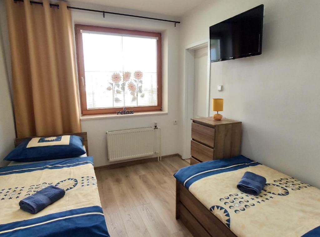 Postel nebo postele na pokoji v ubytování Villa Real Paradise