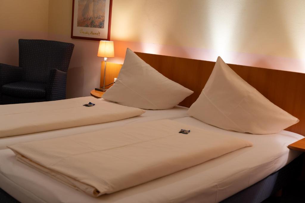 Ένα ή περισσότερα κρεβάτια σε δωμάτιο στο Bestenheider Stuben