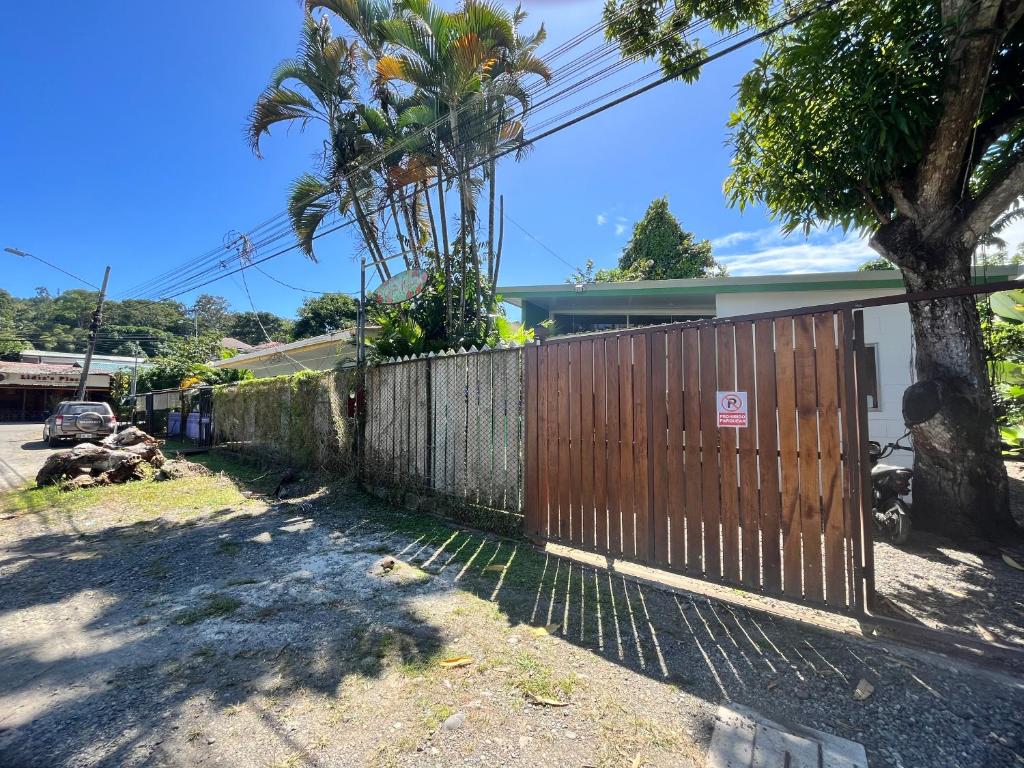 a wooden fence in front of a house at Apartamentos en el Centro de Puerto Viejo in Puerto Limón