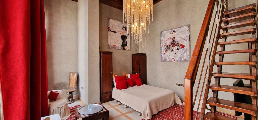 Postel nebo postele na pokoji v ubytování Riad de Vincent
