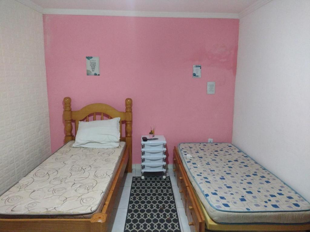 Postel nebo postele na pokoji v ubytování Suite familiar